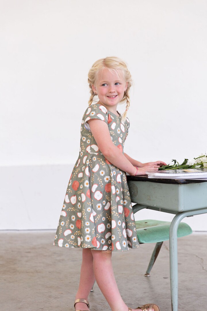 Organic Sage Green Apple Back to School Twirl Dress | MakerPlace by Michaels Organic Sage Green Apple Back to School Twirl Dress | MakerPlace by Michaels